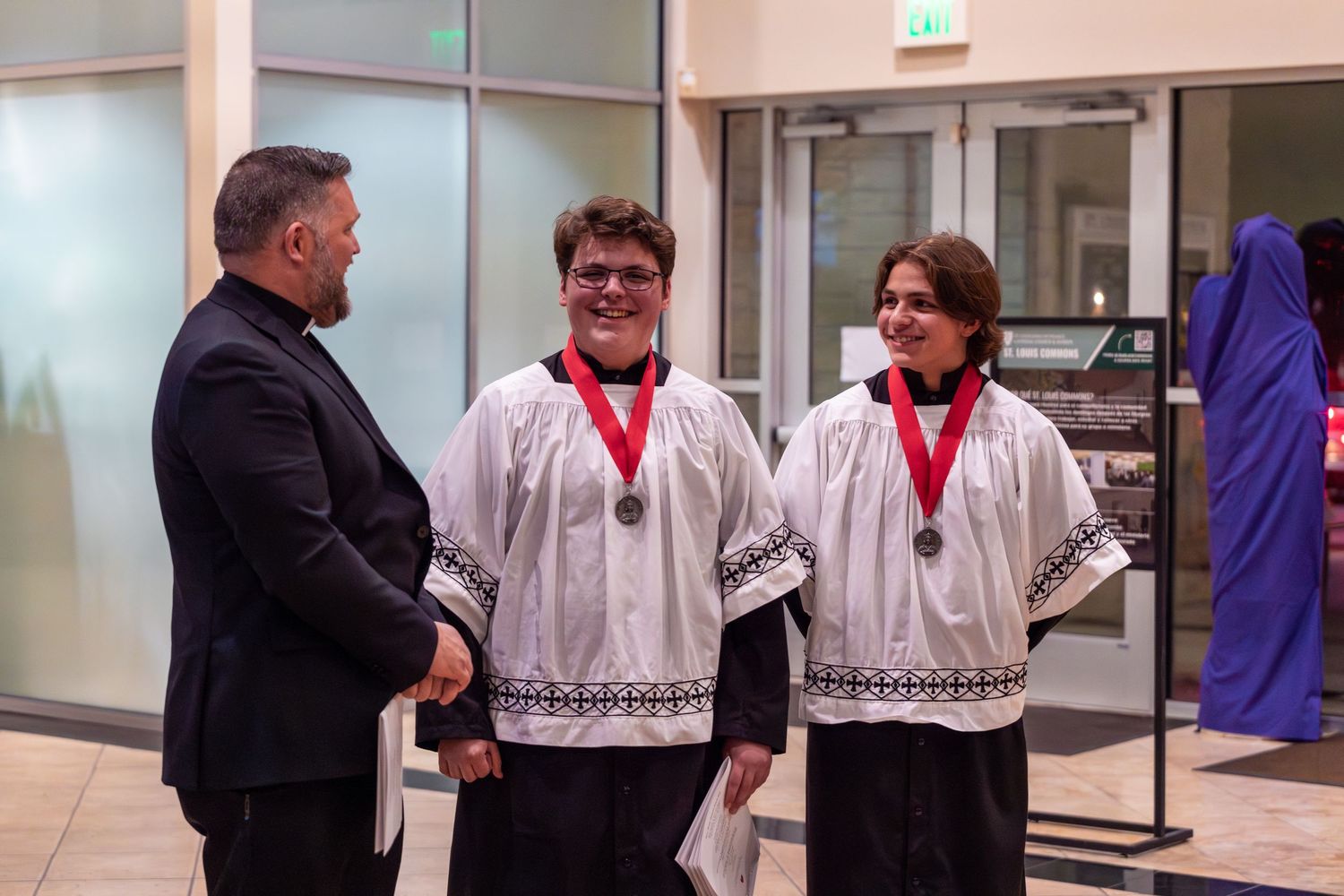 Priest and altar servers