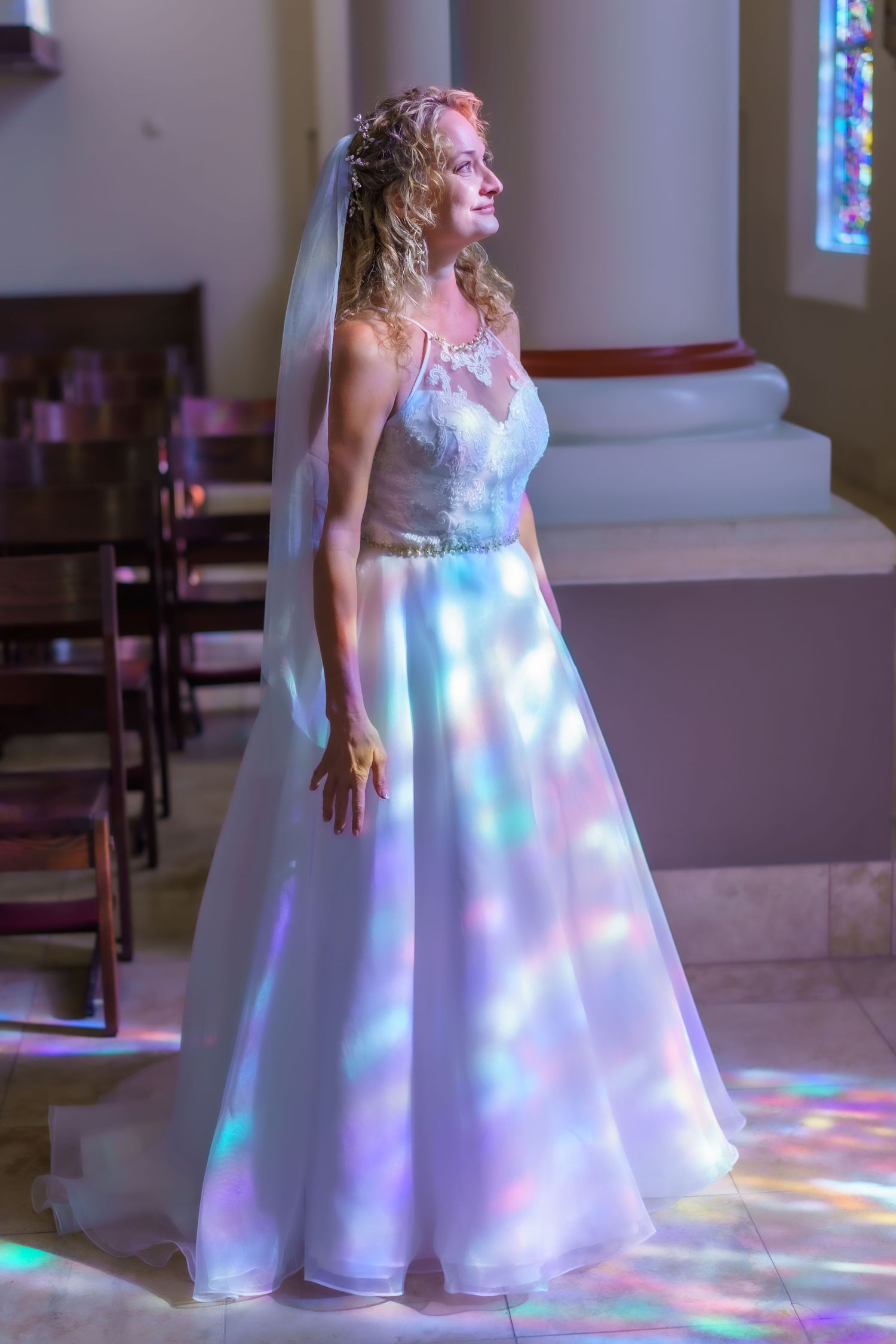 Bride in stained glass light
