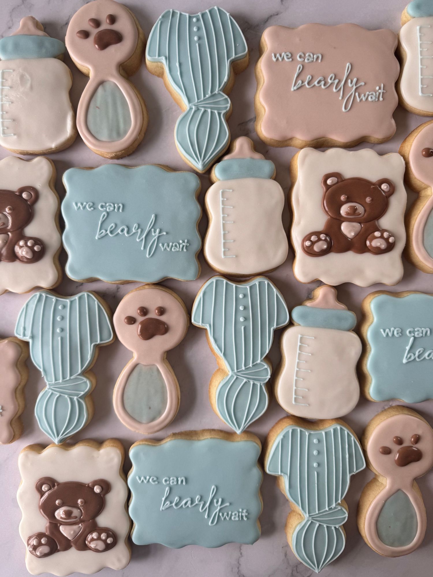 They can barely wait for baby boy to arrive sugar cookies