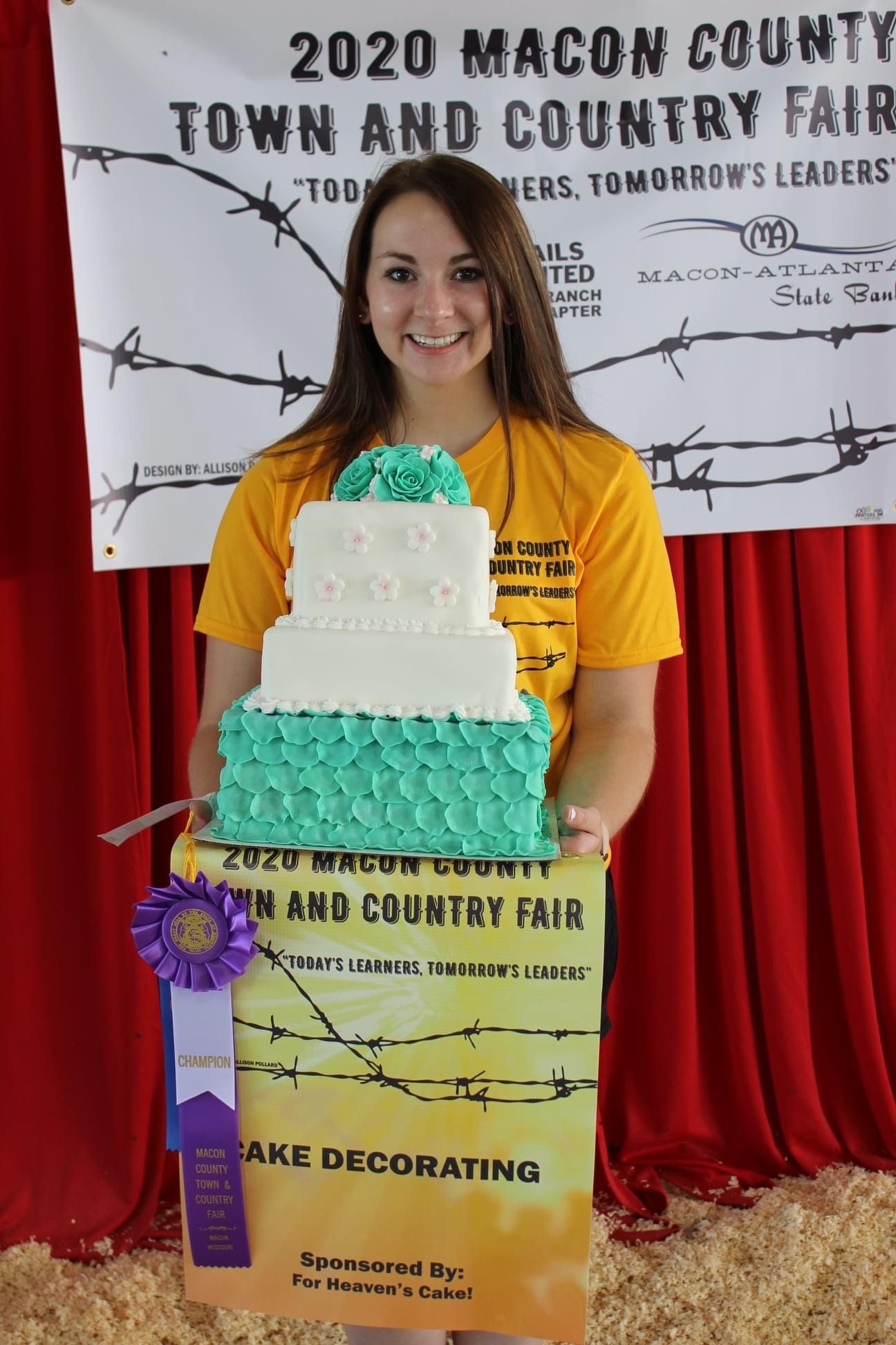 Three mint green and white decorated cakes on display at the 2020 Macon County Town and Country Fair cake decorating contest.