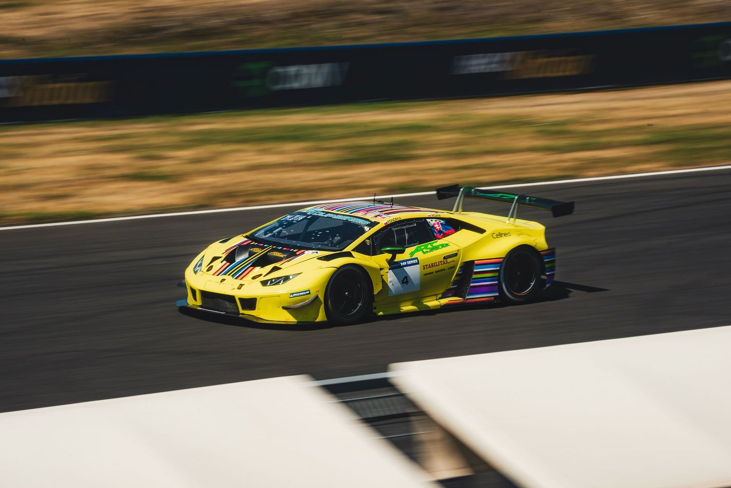 ARC Bratislva yellow Lamborghini Huracán GT3 race car in action during the GT race at Slovakia Ring circuit in Orechová Potôň, Slovakia.