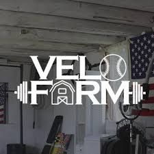 Black and white Vel Farm fitness logo with barbell and baseball icons.