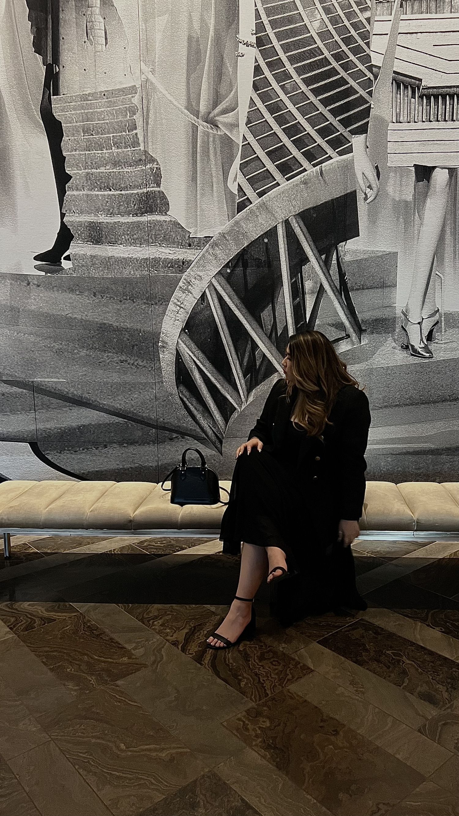 A sequence of black and white photos showing someone sitting on steps against a wall with vintage architectural details.