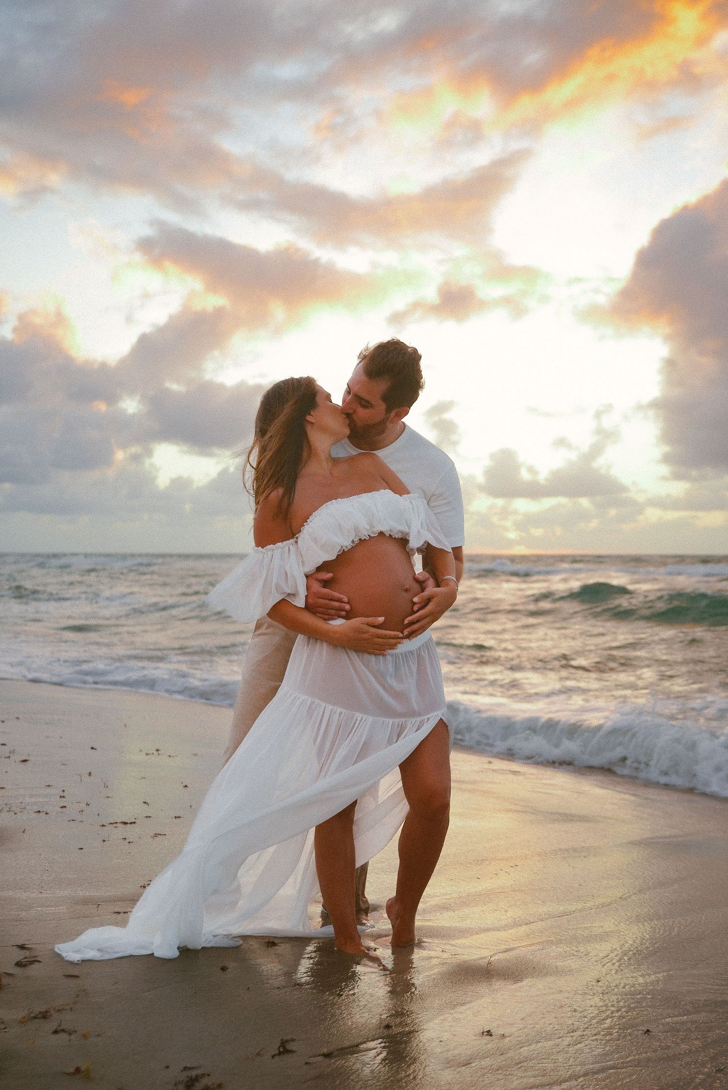 Mother-to-be posing during a sunset maternity session in Miami.