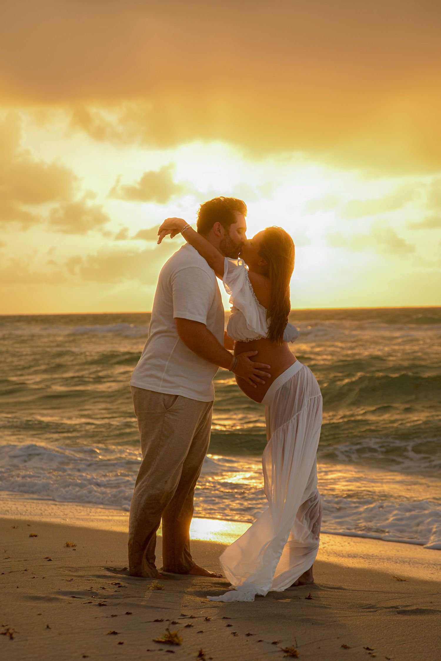 Mother-to-be posing during a sunset maternity session in Miami.
