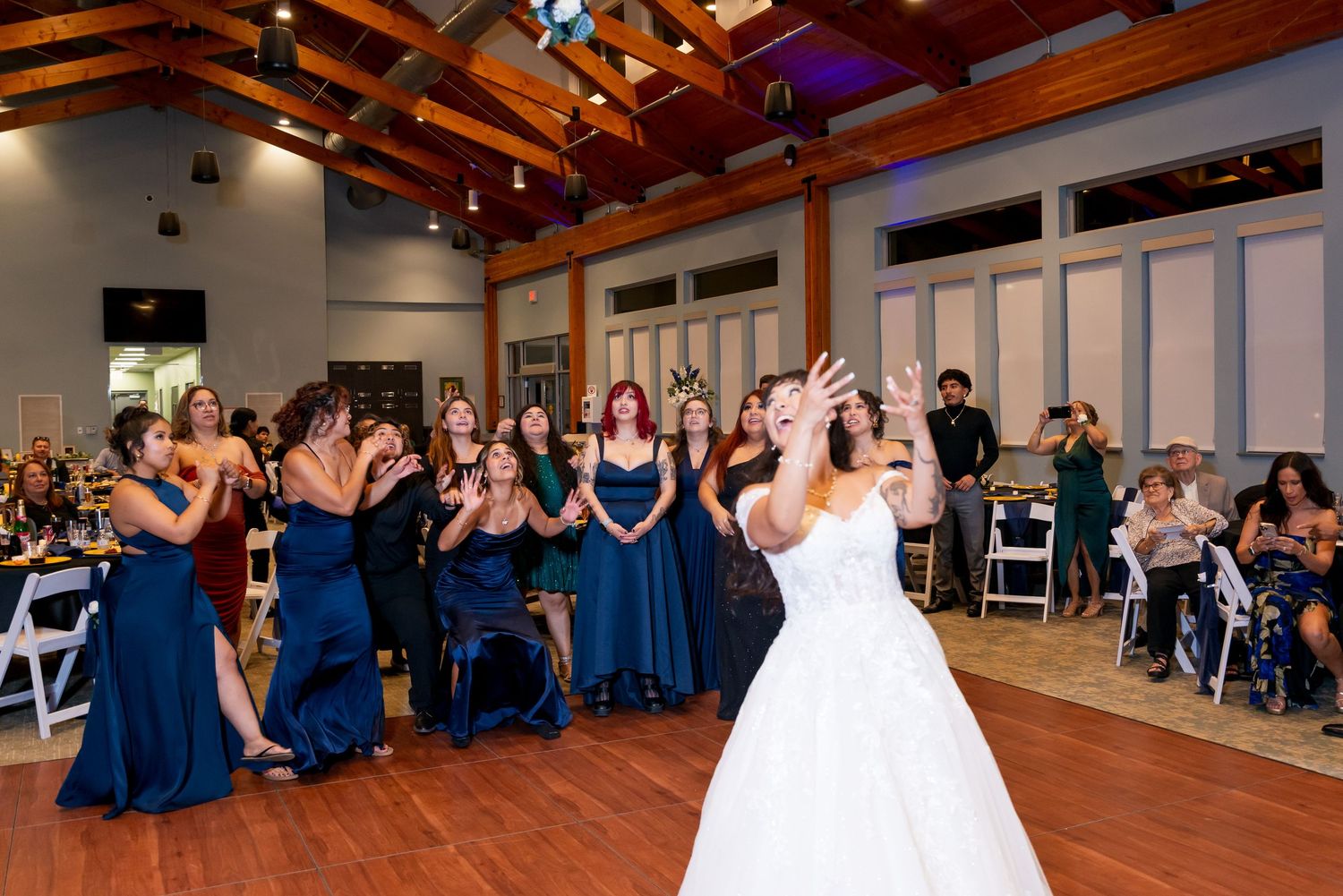 bouquet toss moment bride