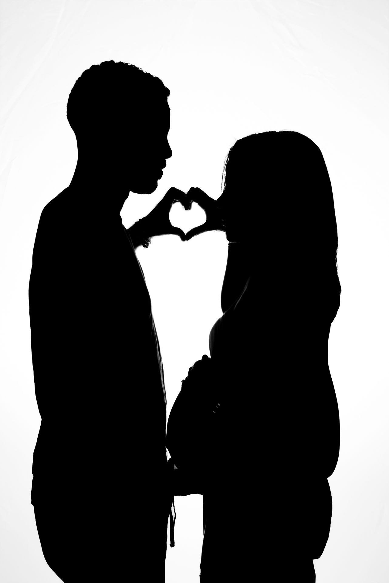 beautiful simple maternity portrait session inddor with mobile lights