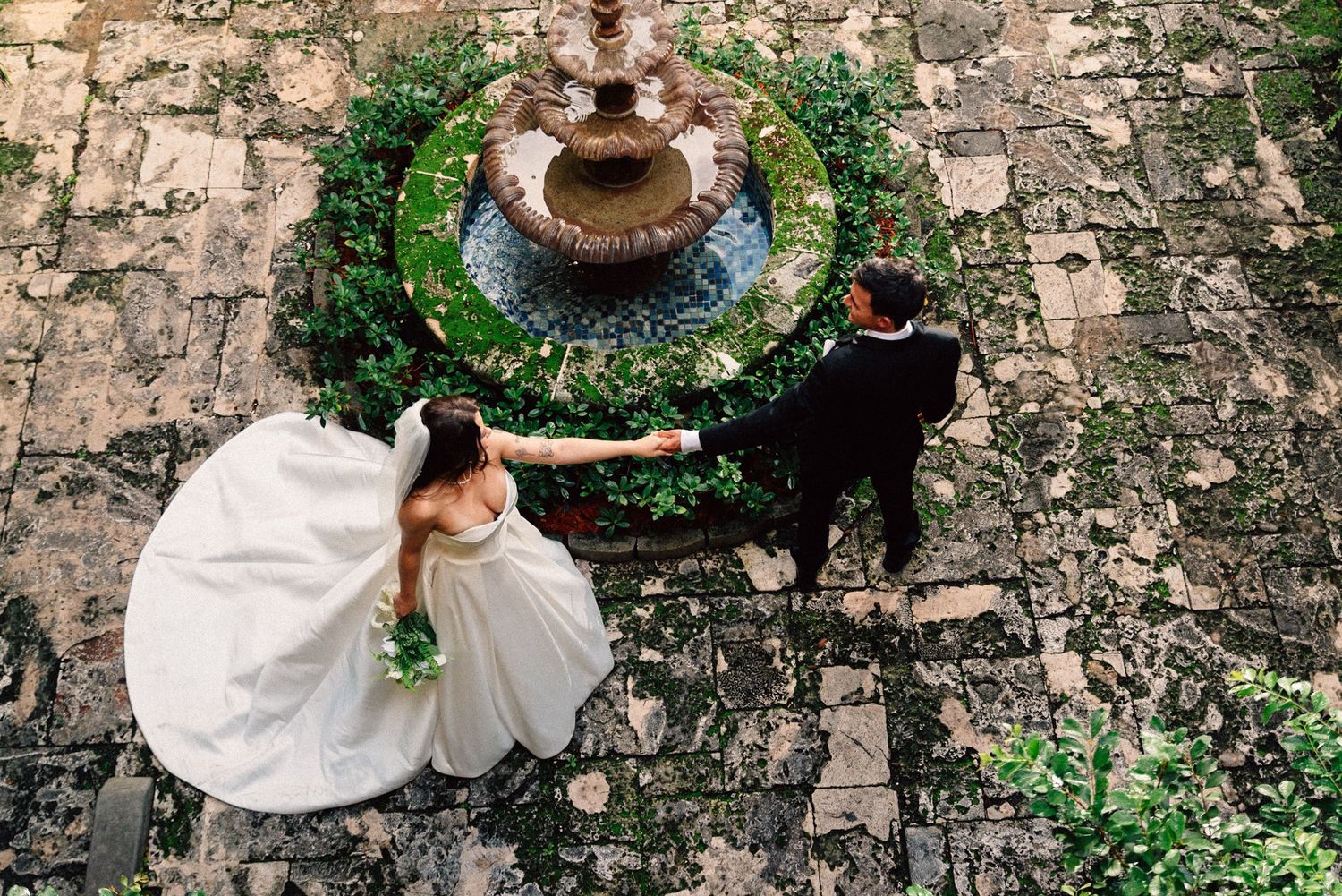 groom guiding the bride  at villa woodbine