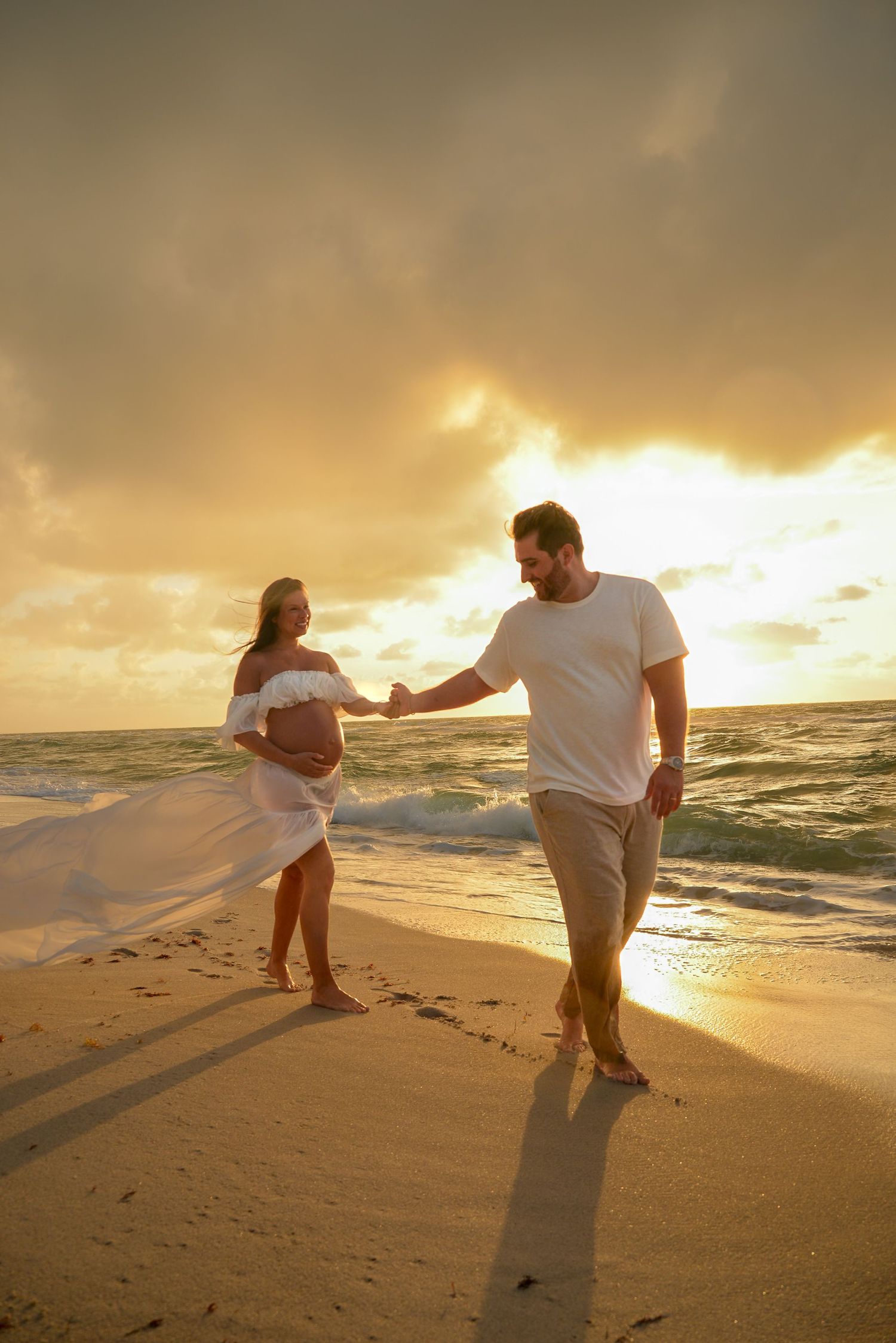 Mother-to-be posing during a sunset maternity session in Miami.