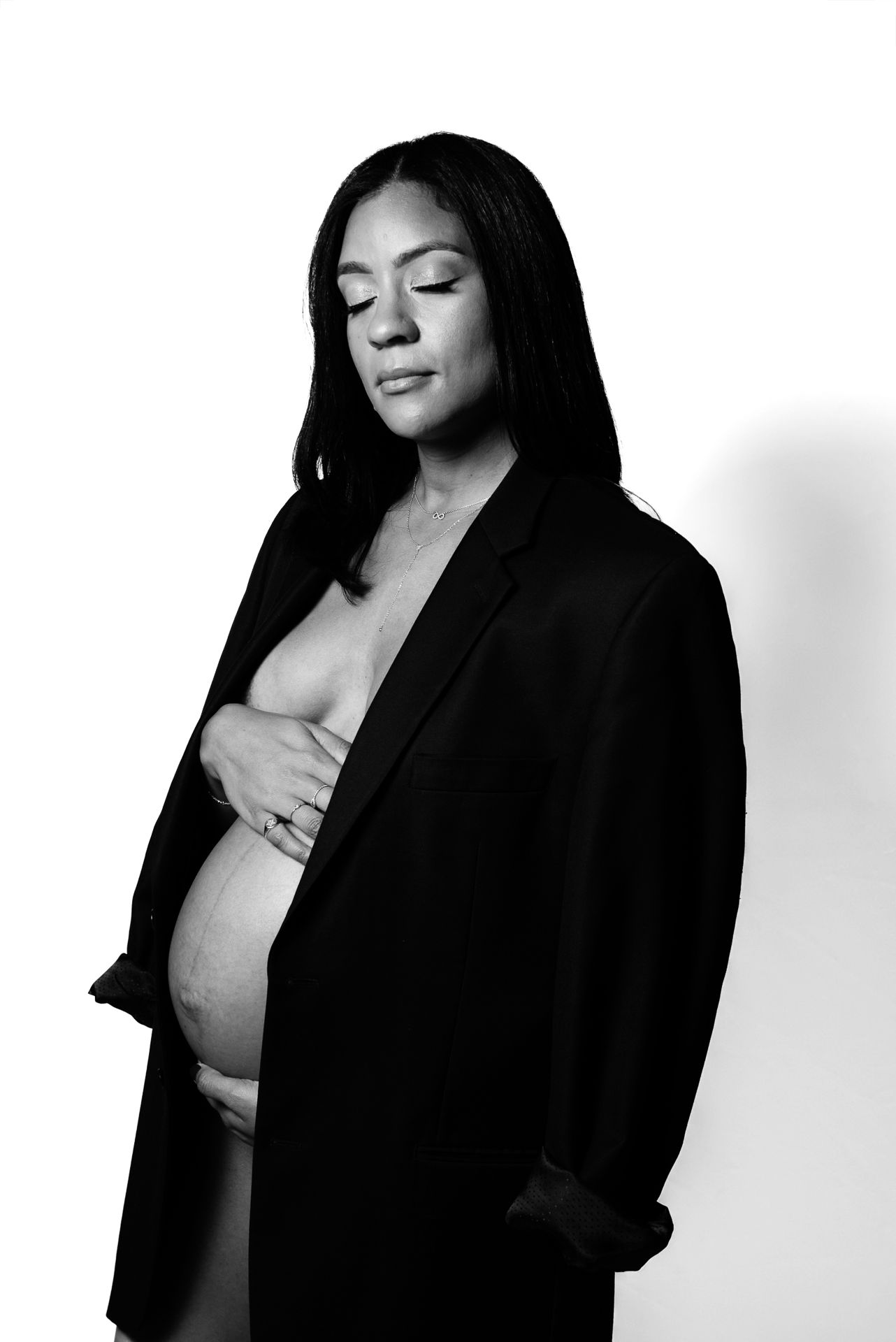 beautiful simple maternity portrait session inddor with mobile lights