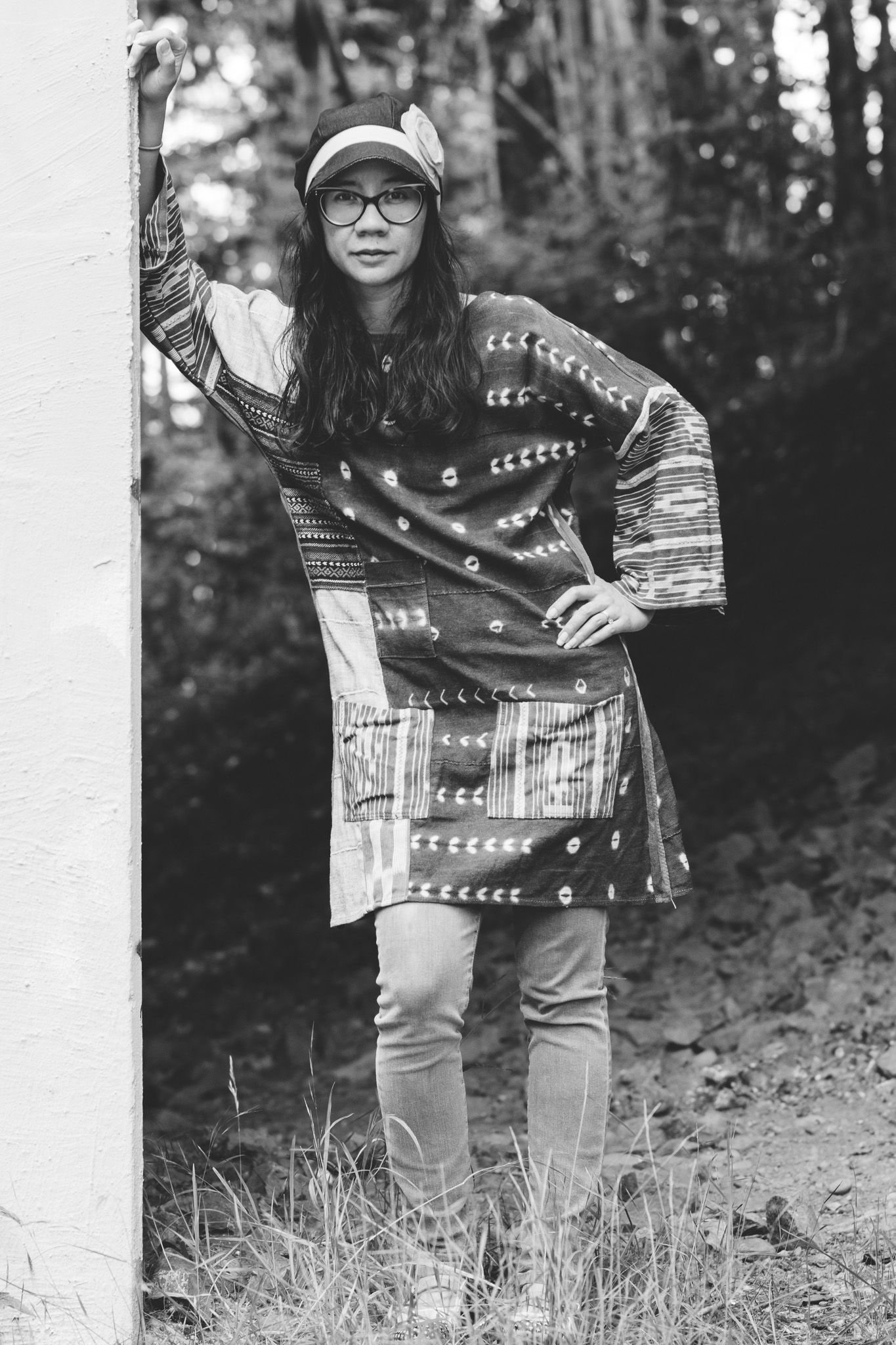 Black and white outdoor portraits featuring casual wear and natural surroundings.