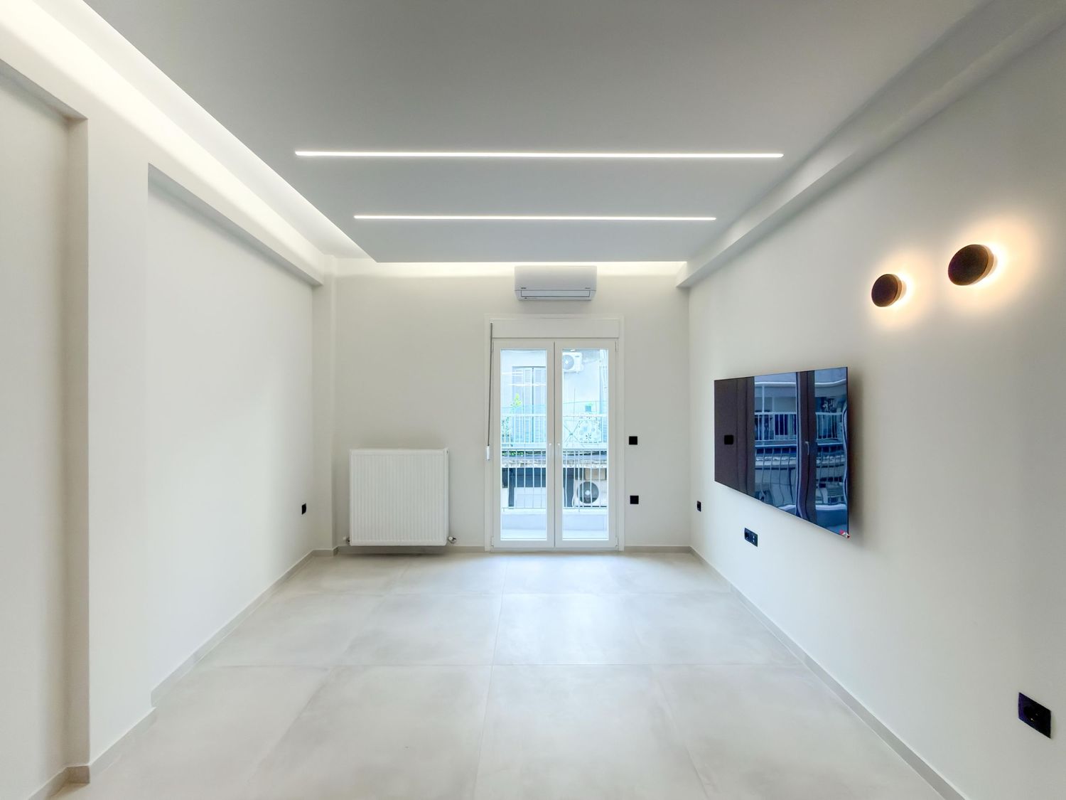 Καλαίσθητο καθιστικό με cozy ατμόσφαιρα και minimal design