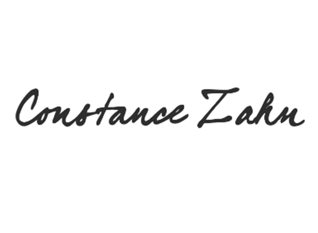 Handwritten script logo for Constance Zahn in black cursive text.