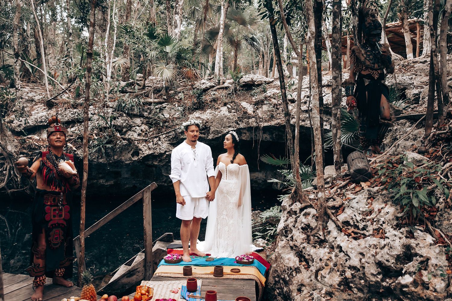 A series of outdoor forest engagement photos showing a couple in white outfits walking and posing among trees.
