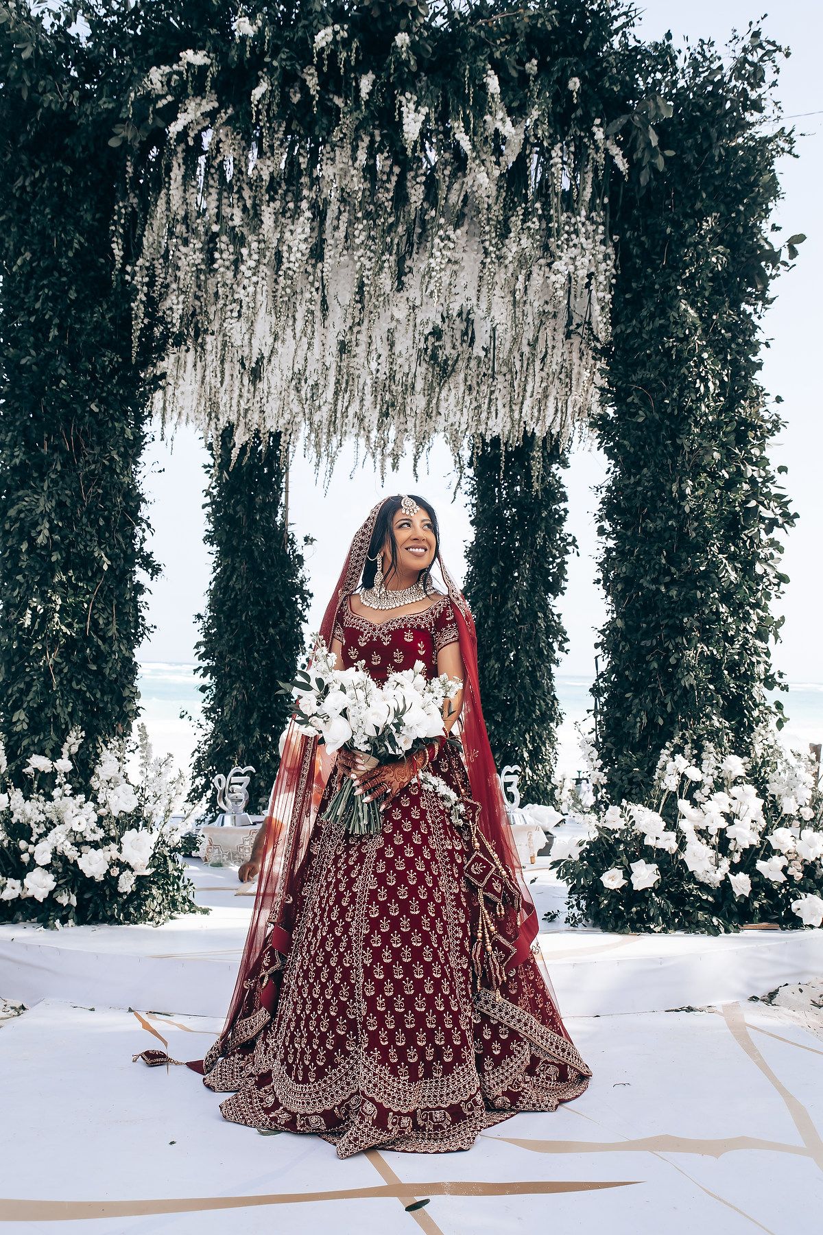 Elegant South Asian wedding portraits on the beach in Cancun Mexico