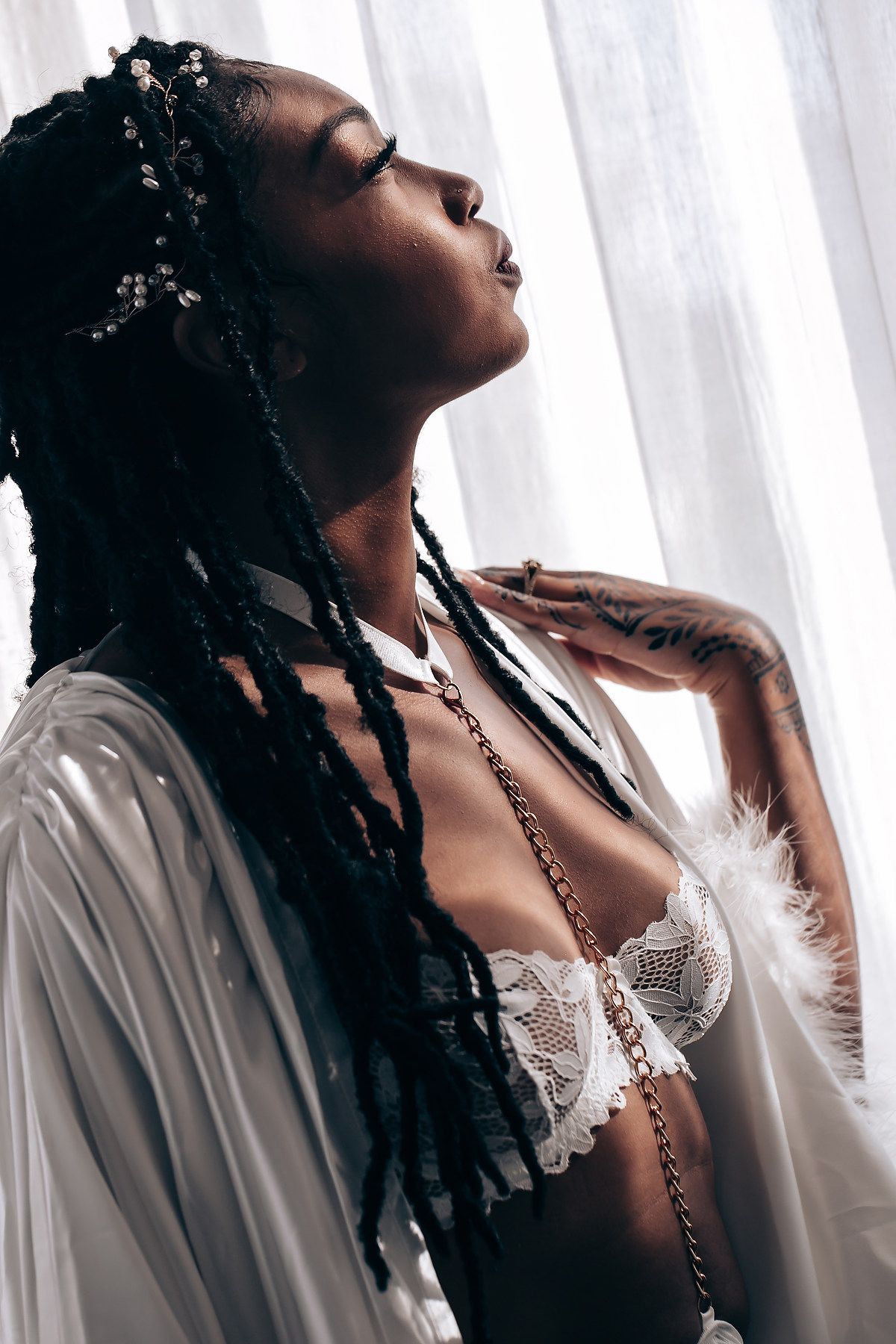 A series of artistic portrait photographs showing someone with braided hair in white clothing against a light background.