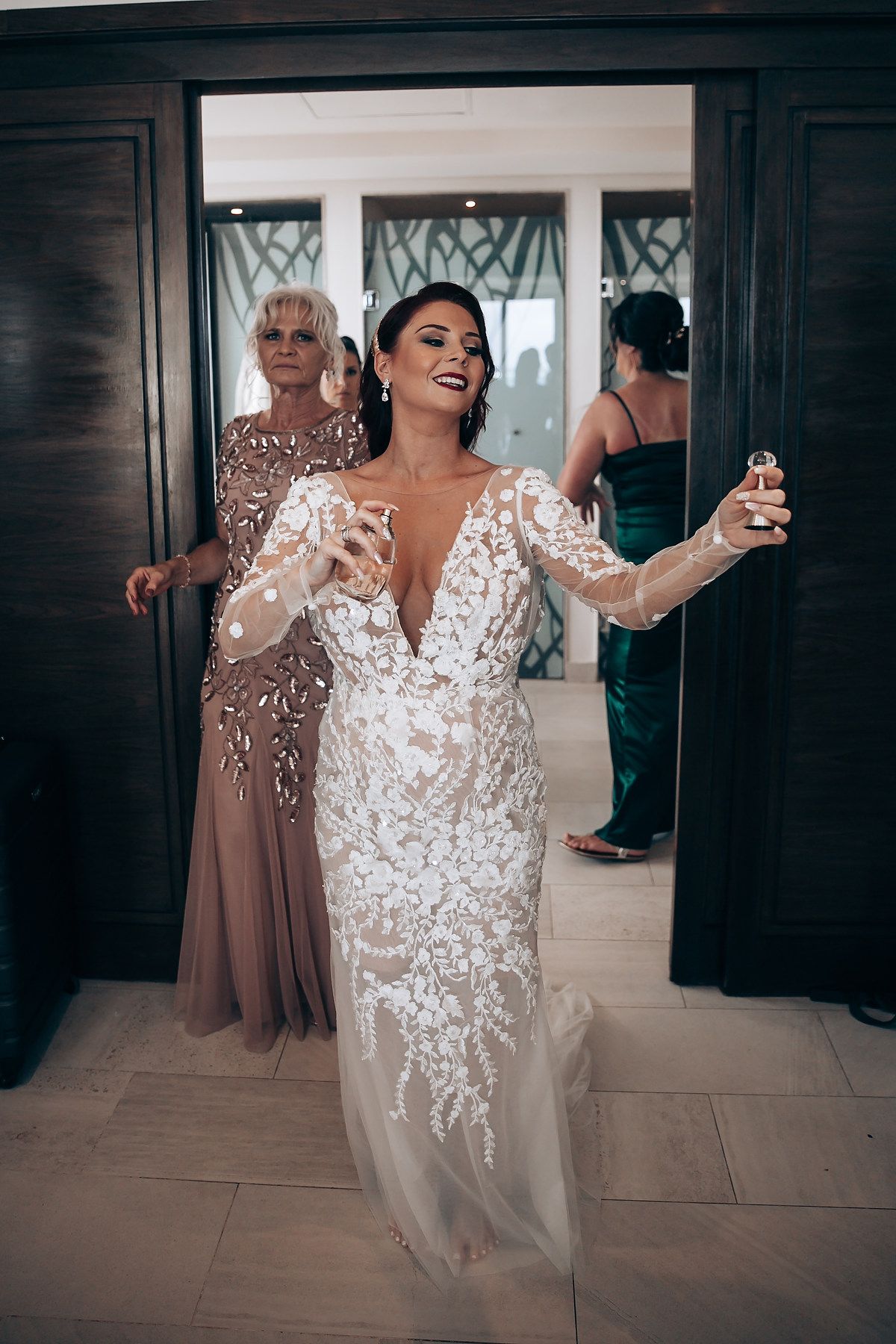 A sequence showing someone dancing and celebrating in an elegant lace wedding dress.