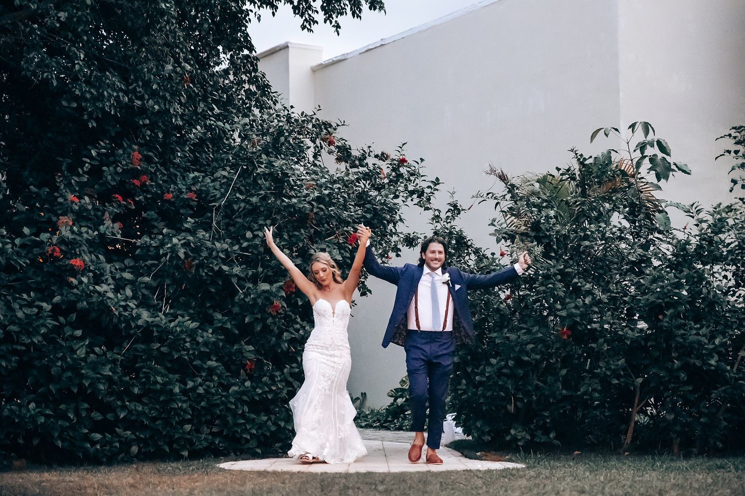 Joyful wedding celebration moments captured in an outdoor garden setting.