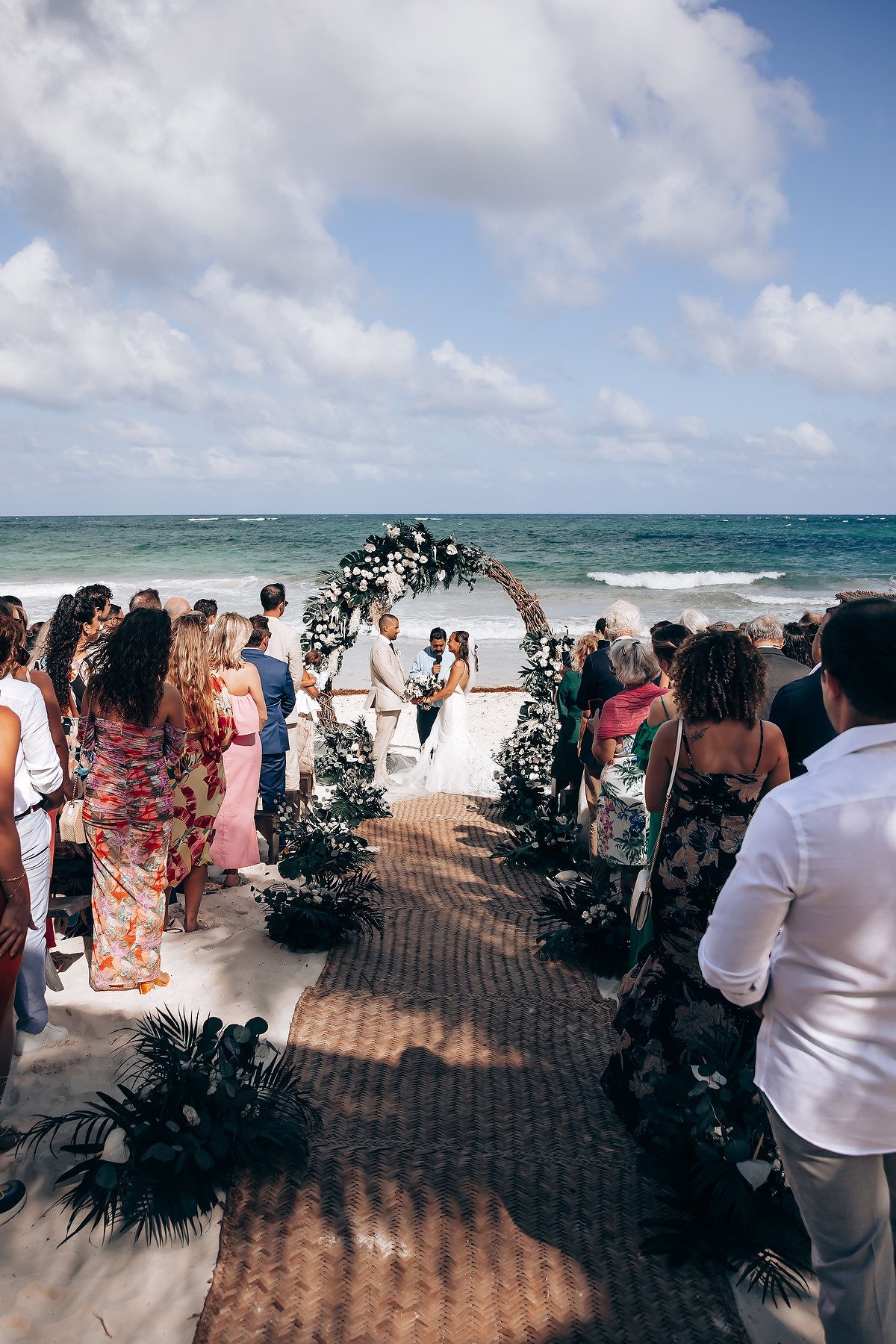 Beach wedding celebration at NEST Tulum Riviera Maya Mexico