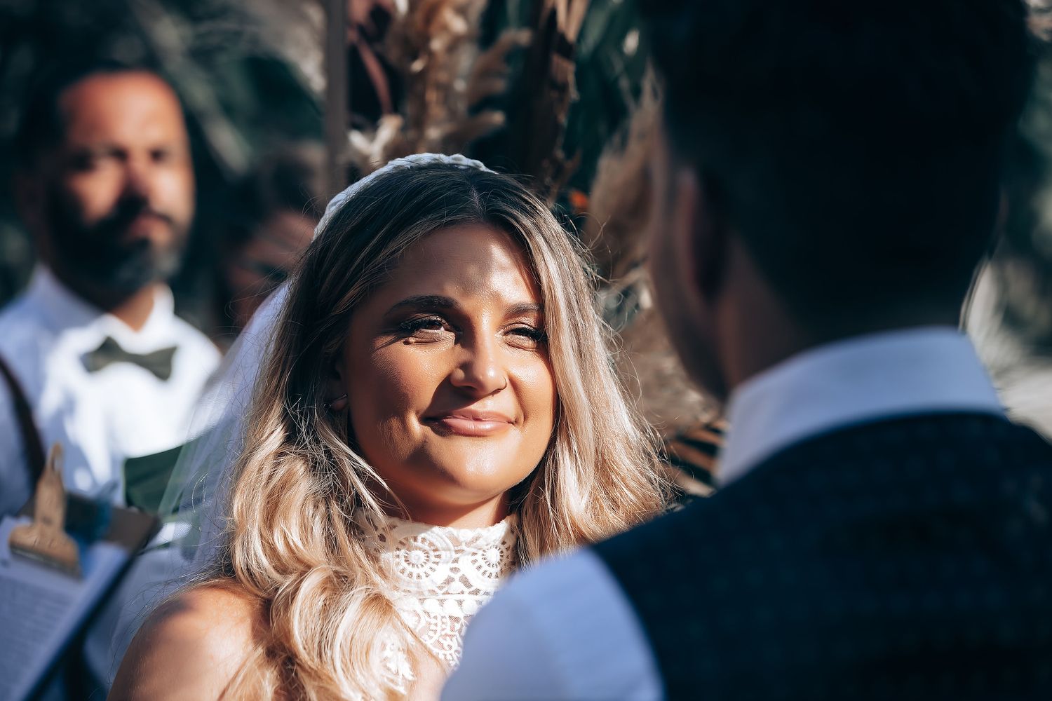 A series of candid outdoor wedding photos showing joyful moments in a natural setting.