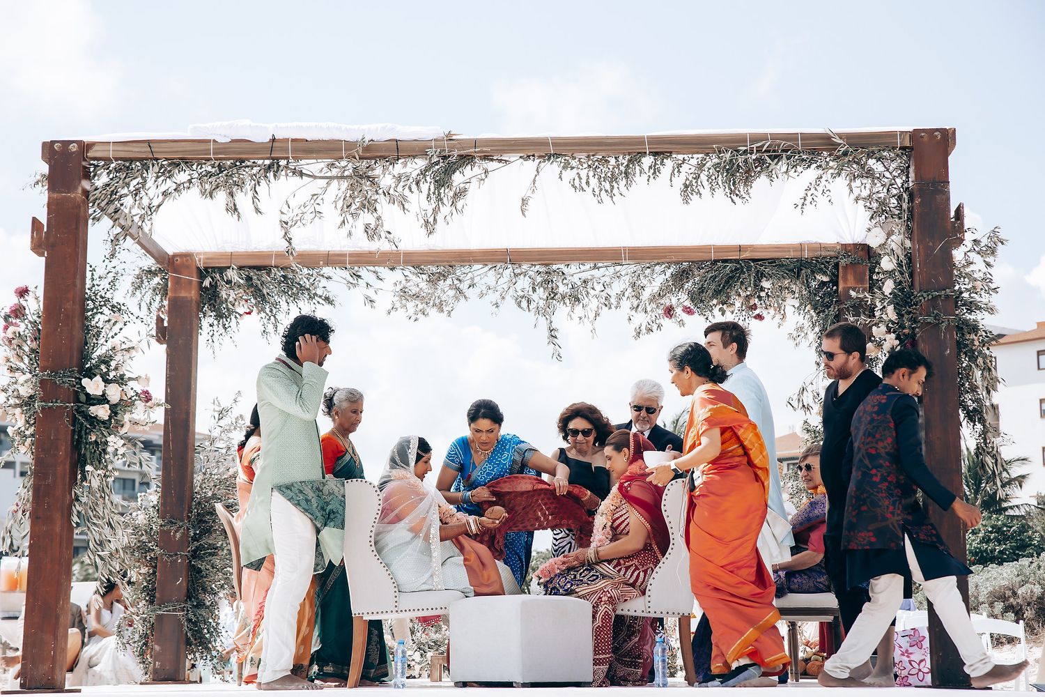 Panoramic view of a decorated outdoor wedding venue with white canopy.