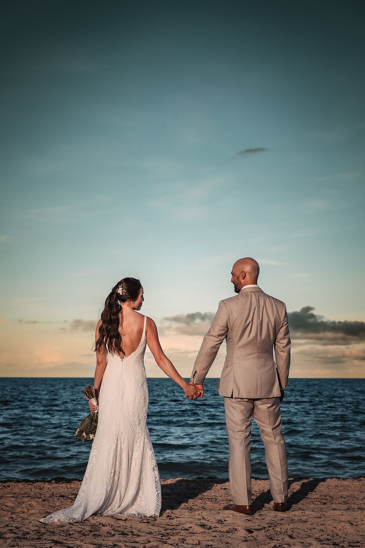 Sunset wedding photos at TRS Coral Costa Mujeres Cancun
