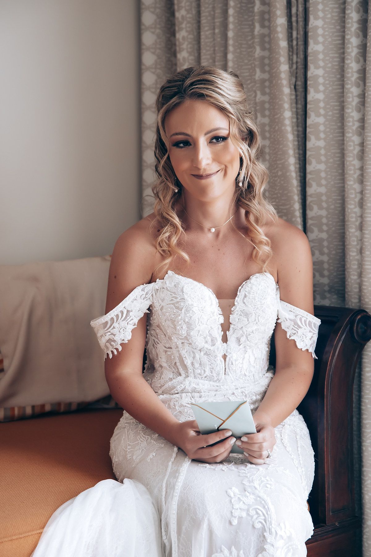 Series of photos showing bride in white lace gown sitting and checking her phone during wedding preparations.