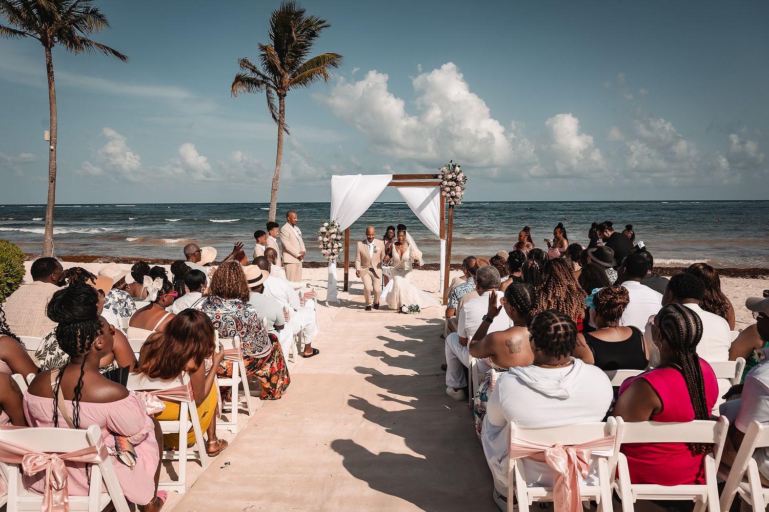 Bride and groom wedding ceremony at Dreams Tulum beach venue Riviera Maya