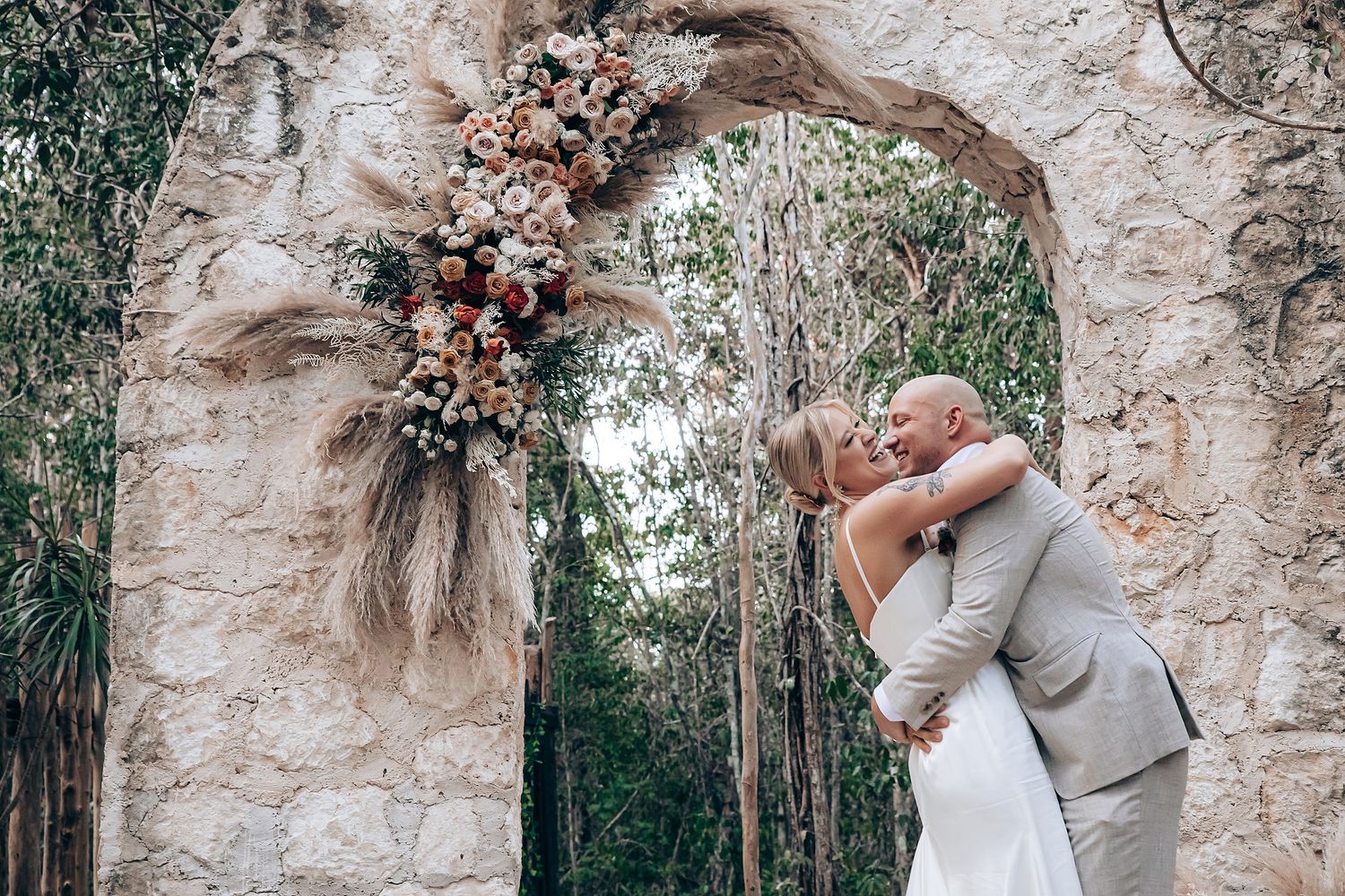 Arcadia Tulum wedding photography with iconic arches and jungle
