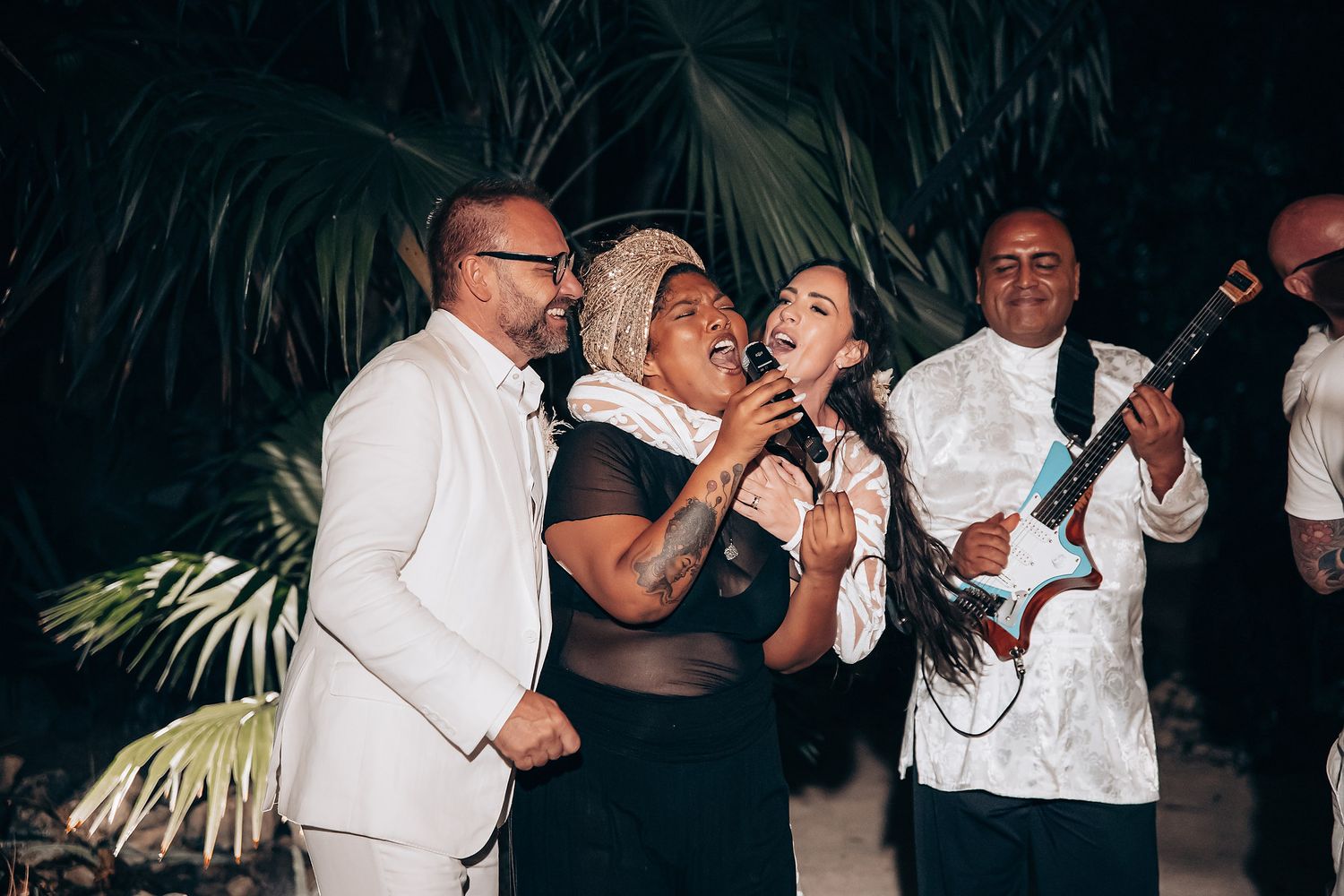 A series of candid black and white party photos showing people dancing and celebrating at a lively event.