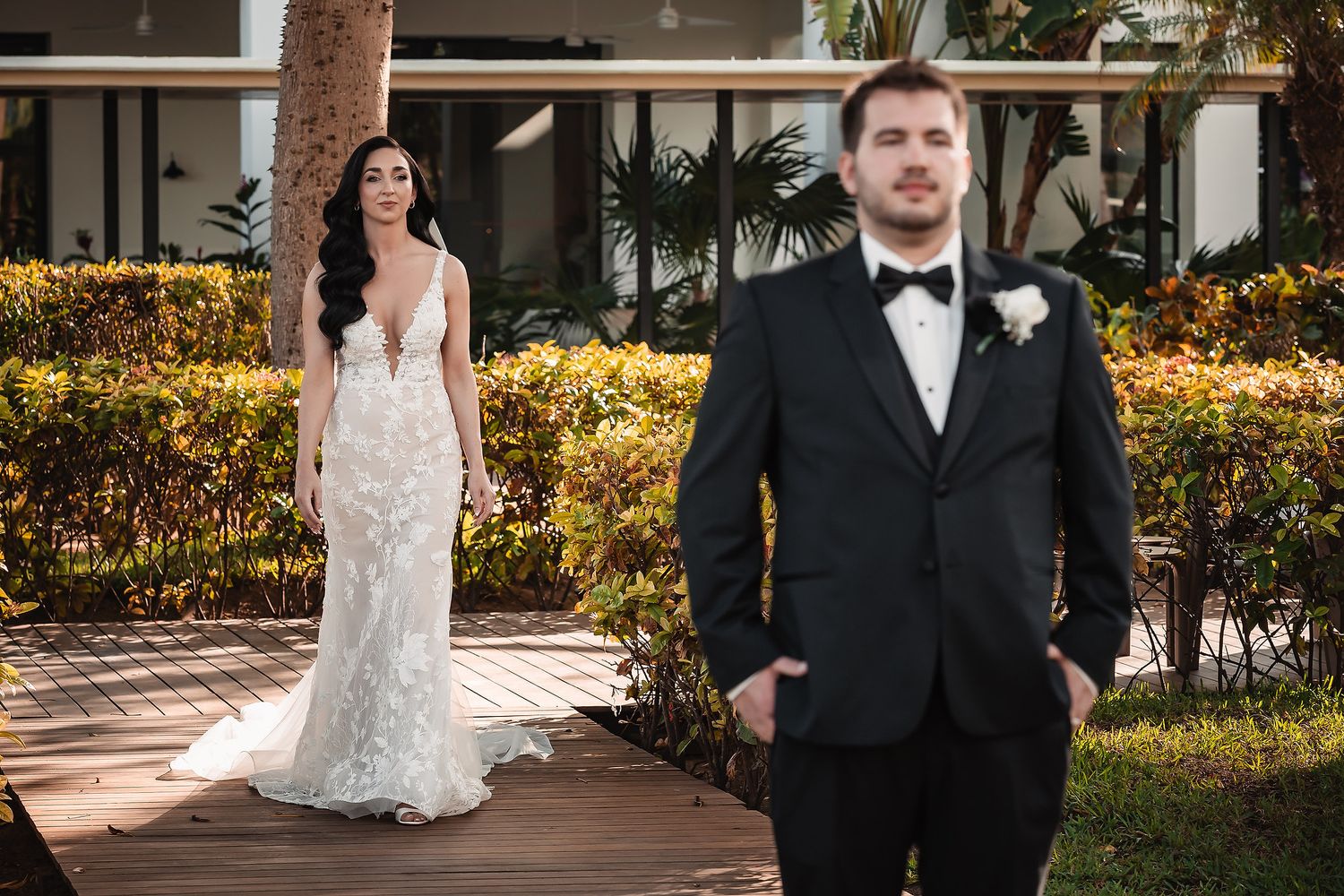 Wedding photography sequence showing formal portraits of a couple outdoors with lush garden landscaping.