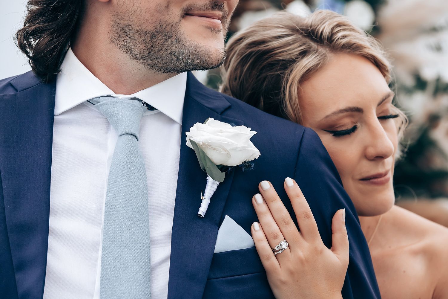 Emotional wedding day moments captured in a series of close-up shots showing tears and tender embraces.