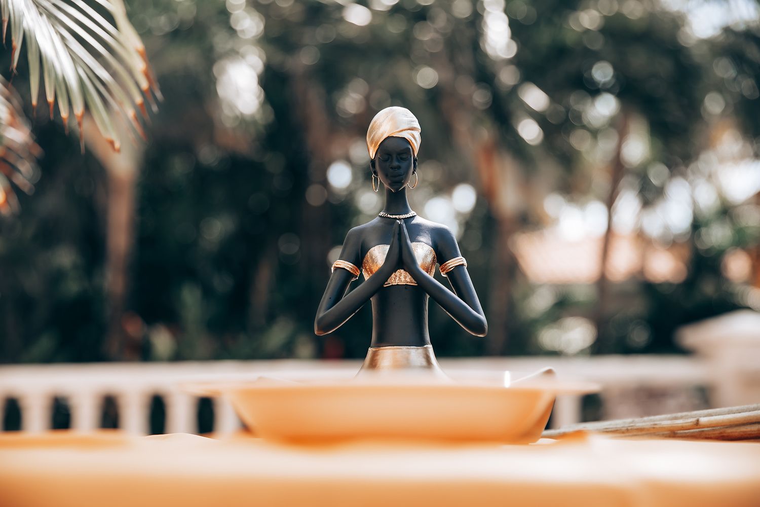 A photographer captures moments at an outdoor wedding reception table setting.