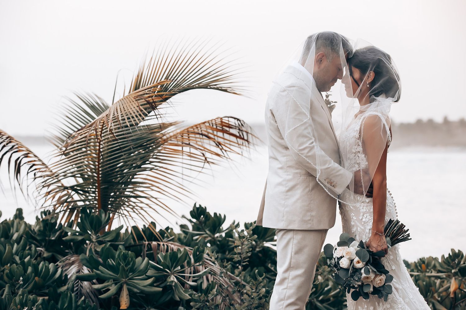 Barcelo Riviera Maya bride and groom portrait by the sea