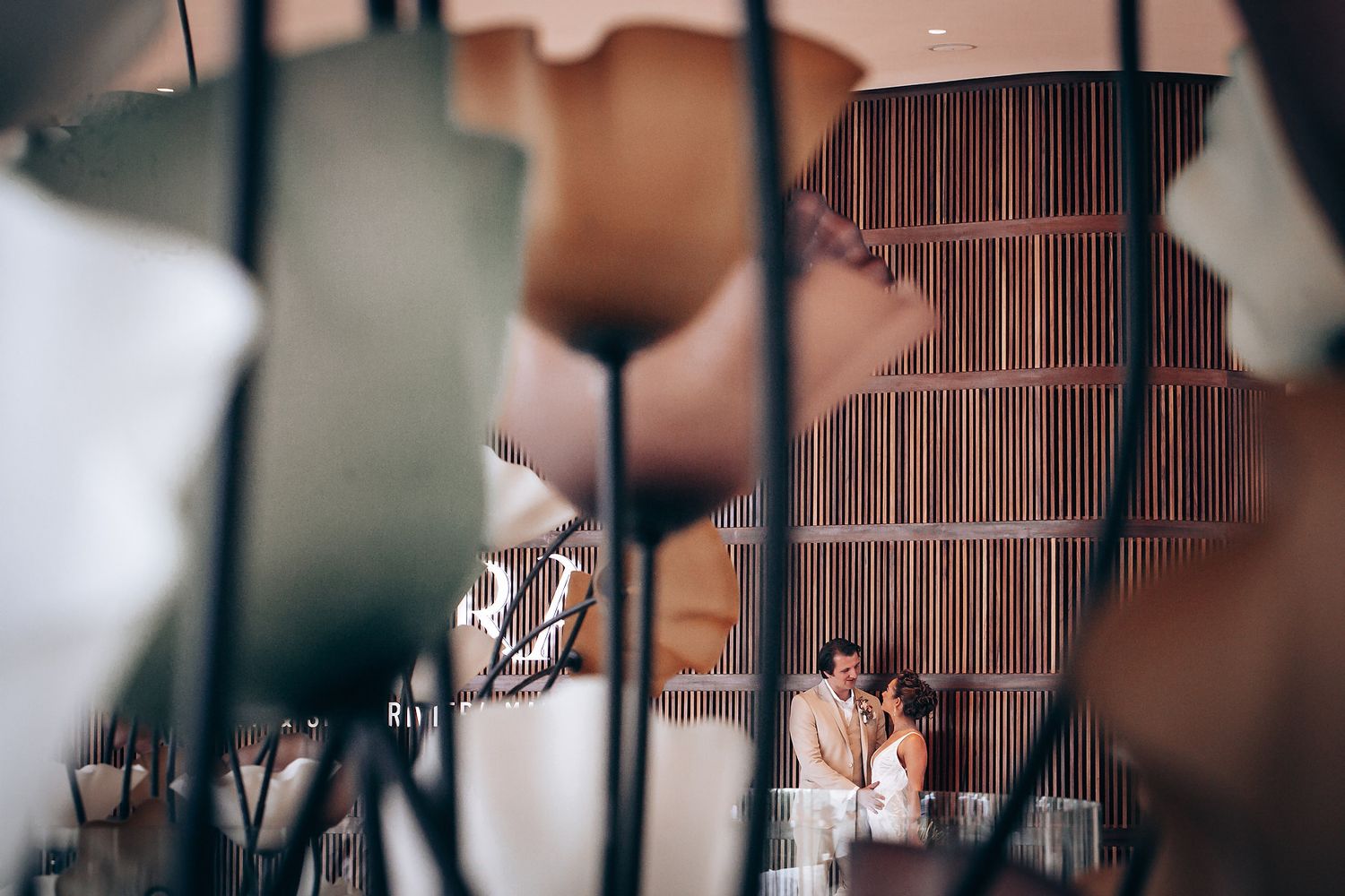 Elegant wedding reception venue with decorative details and soft lighting.