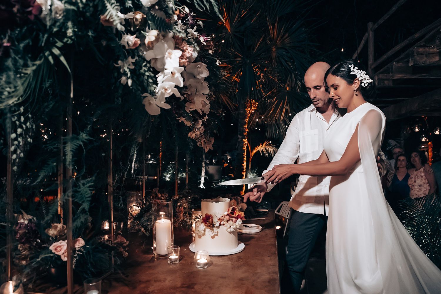 Couple shares an intimate moment during their wedding reception.