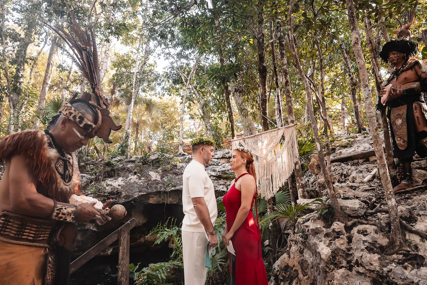 Traditional Mayan ceremony in a lush jungle setting with smoke and ritual elements.