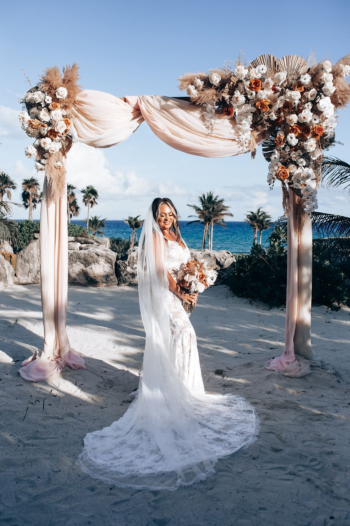Xcaret Park destination wedding ceremony by the ocean