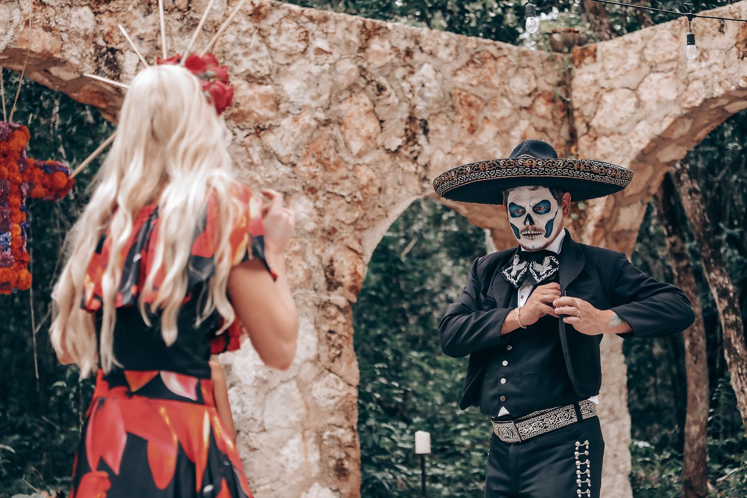 Dancing sequence showing dramatic spins and movements against rustic stone wall backdrop.