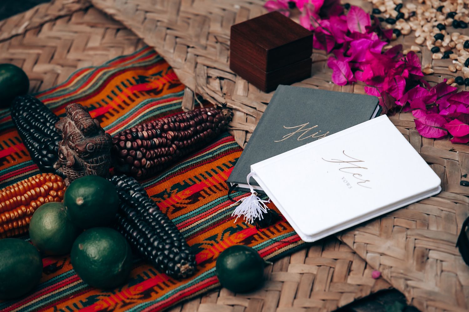 Traditional Mexican wedding decorations with bright flowers and woven textiles on display.