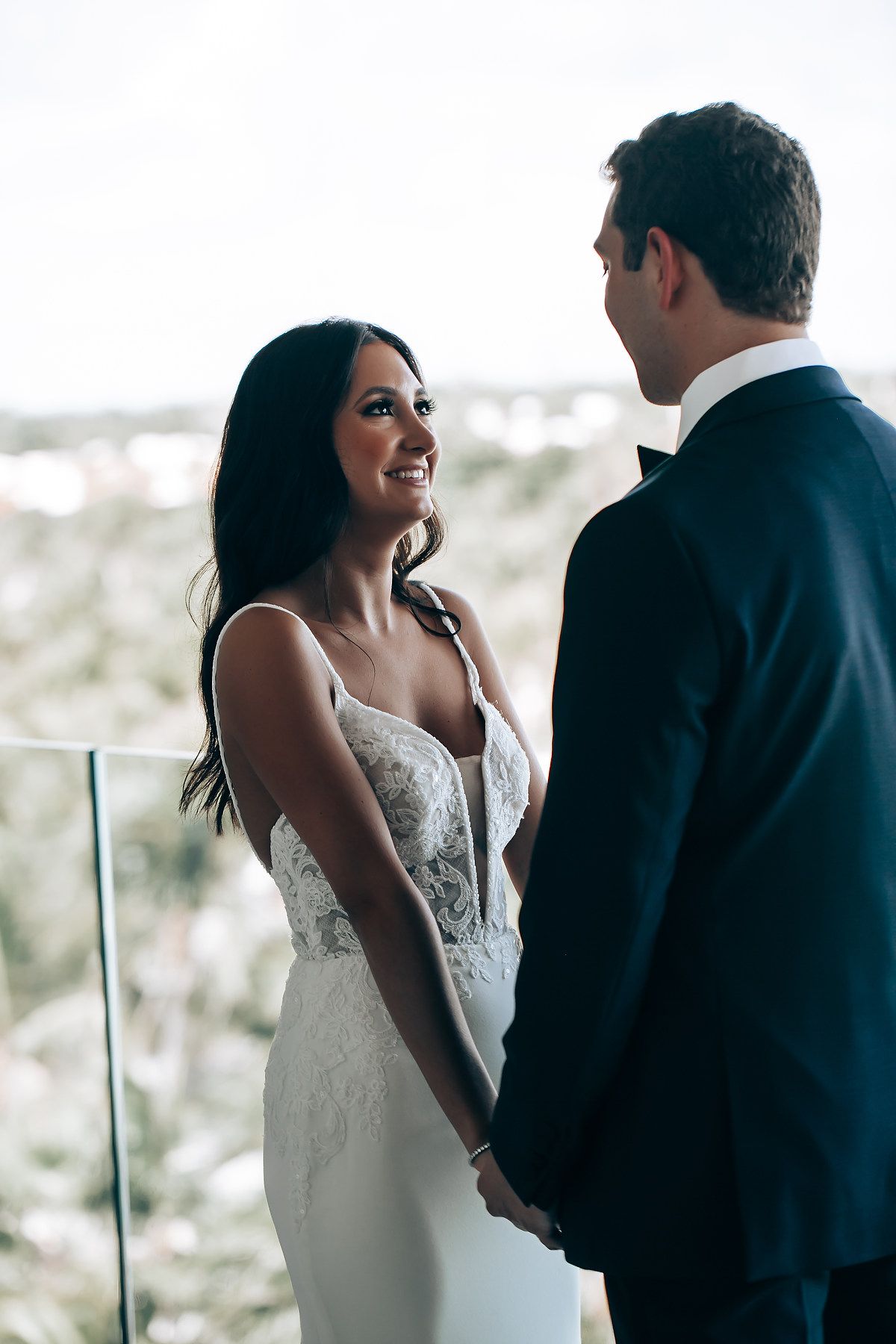 An intimate moment captured between a couple during their wedding ceremony.