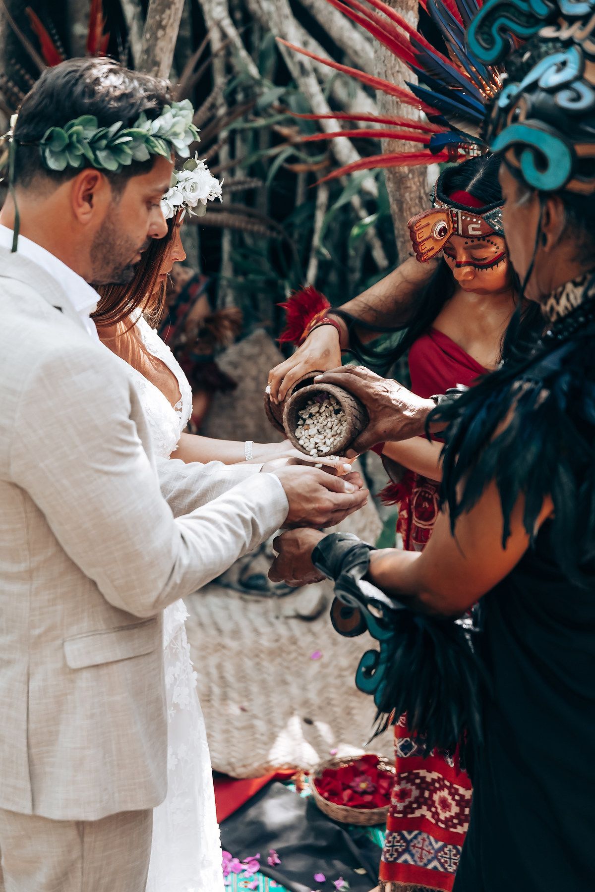 Traditional blessing ceremony with copal offerings and indigenous ceremonial elements.