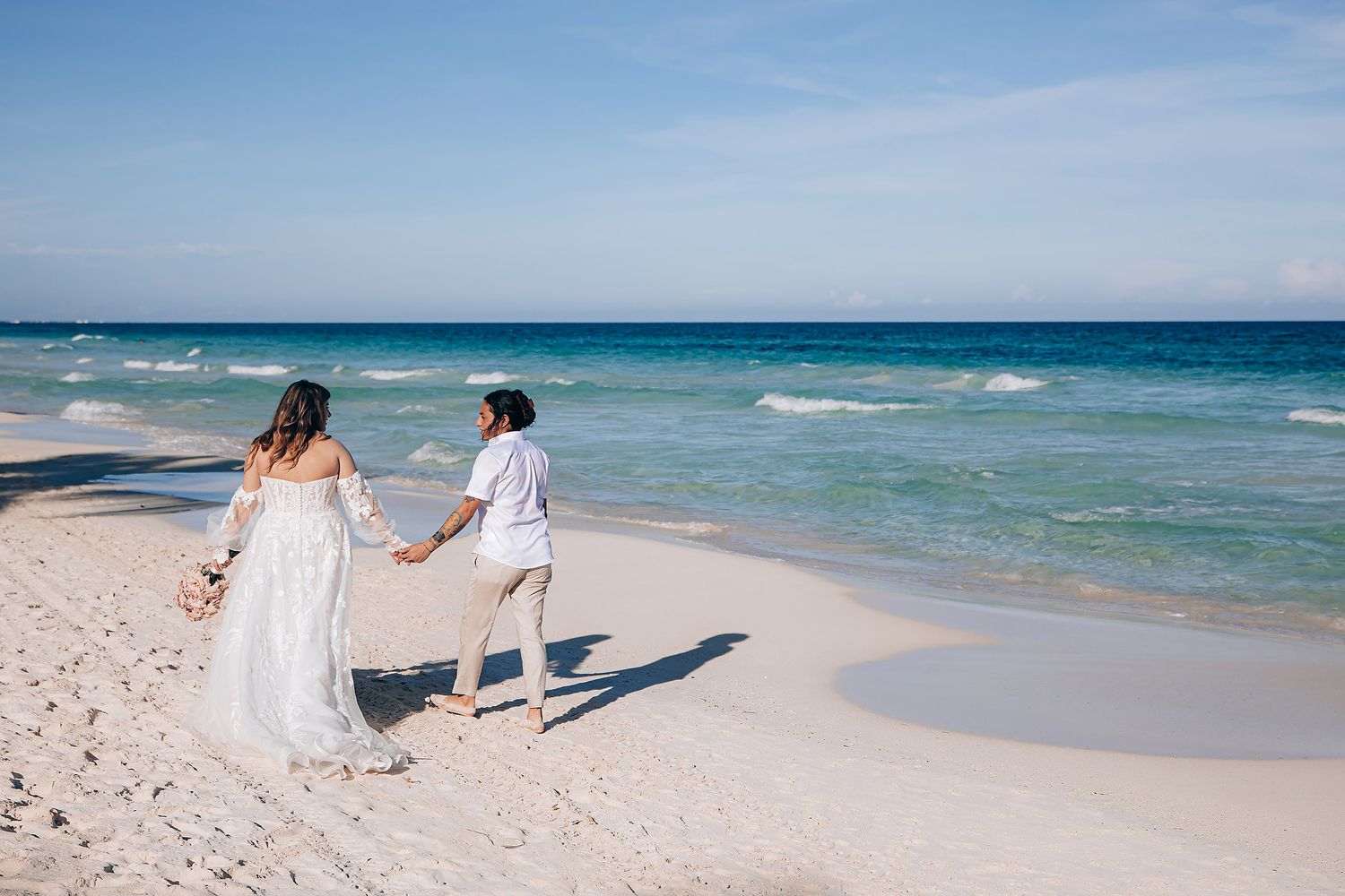 Beach wedding ceremony at Nu Tulum boutique hotel