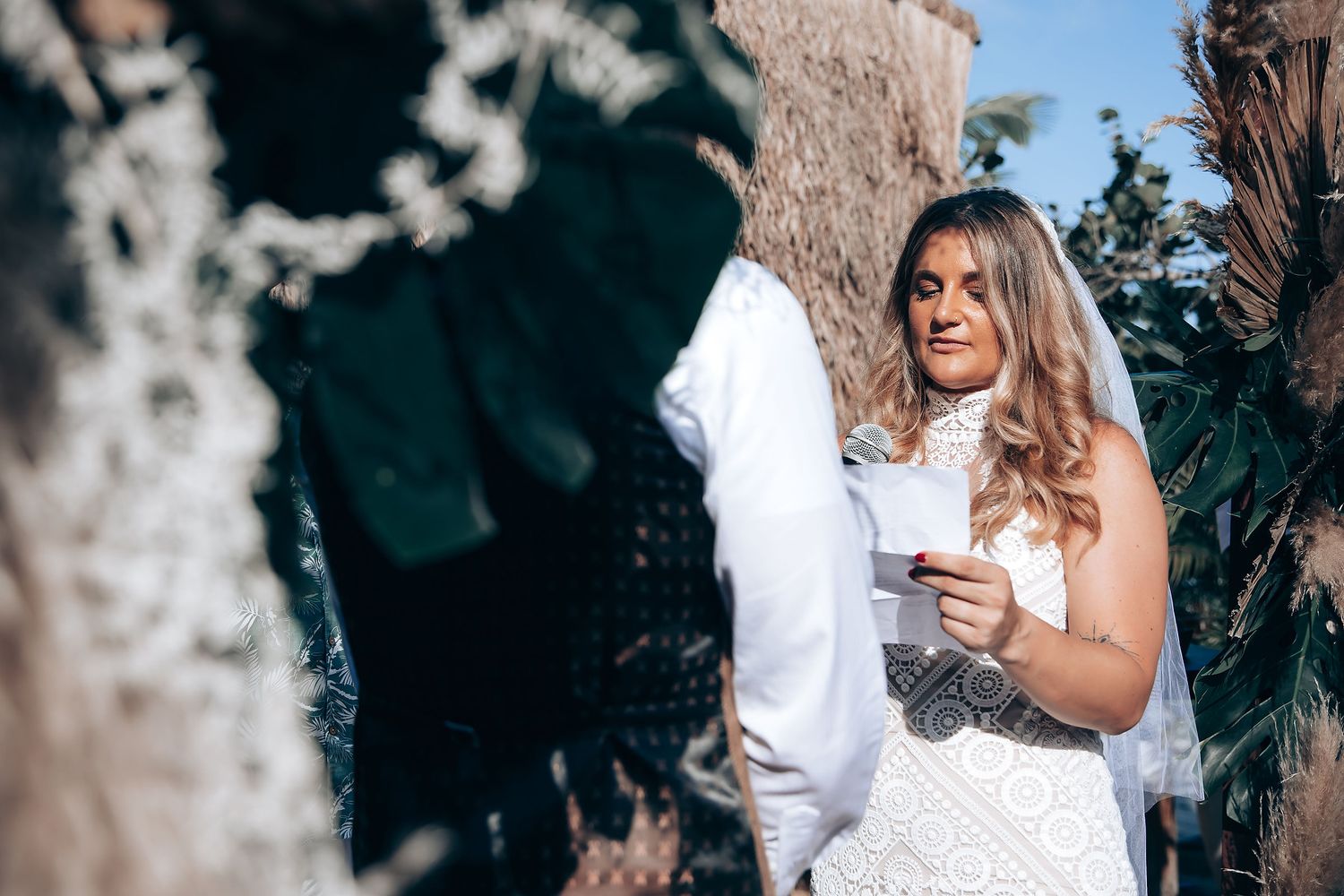 A collection of romantic wedding photos captured in a garden with soft natural lighting.