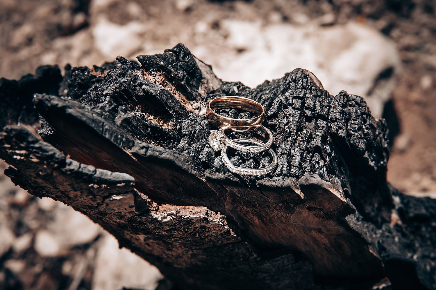 Close-up detail of burnt wood and ceremonial elements from a traditional wedding ritual.