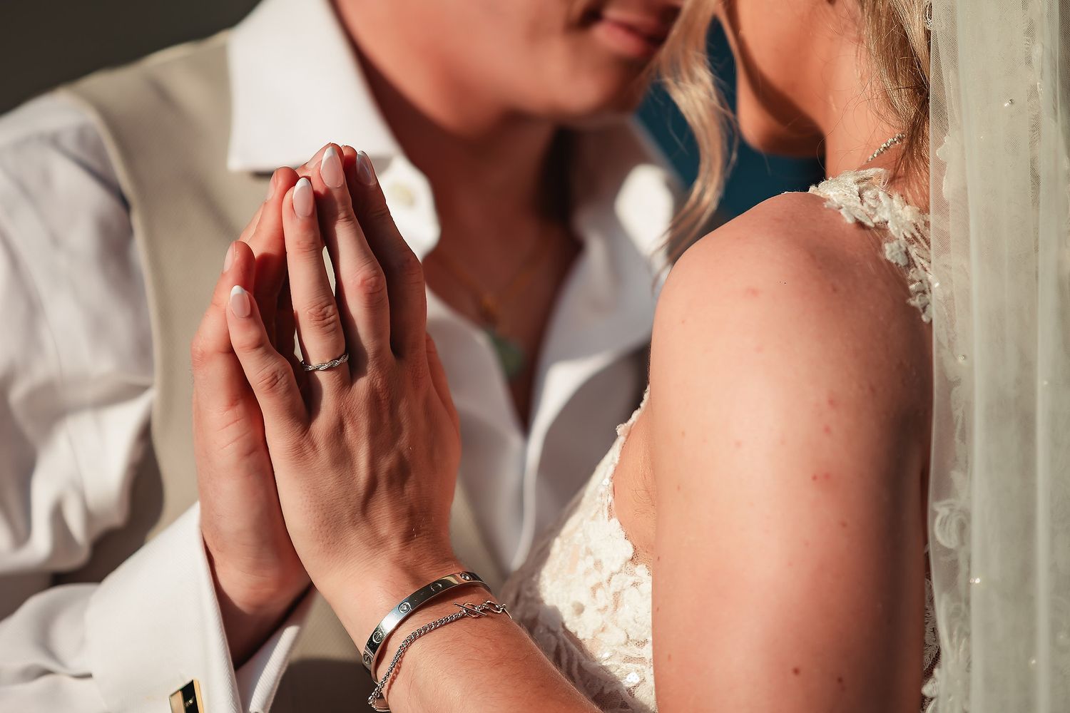 Intimate wedding couple moment captured in soft natural light.