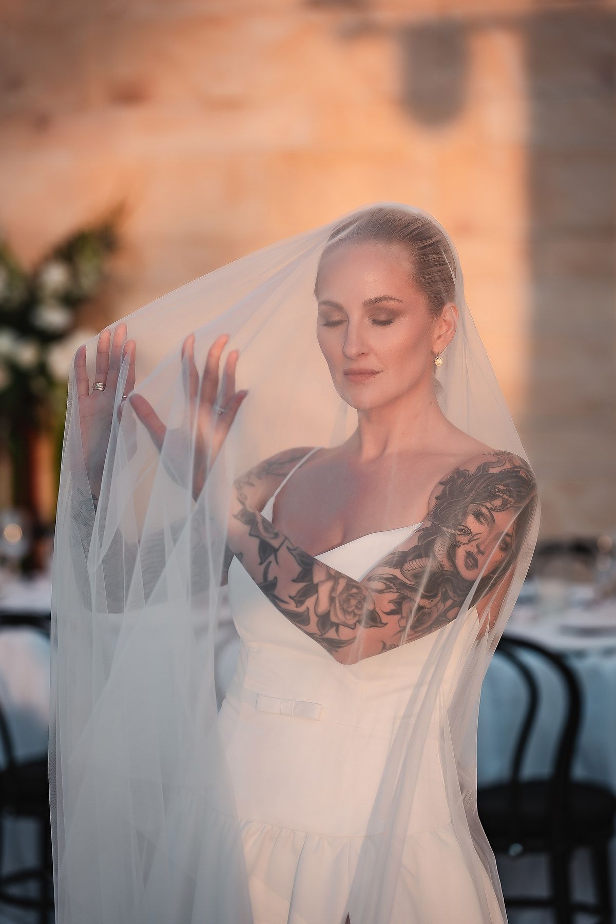 A series of ethereal bridal portraits showing a flowing white veil against a soft sunset-lit background.