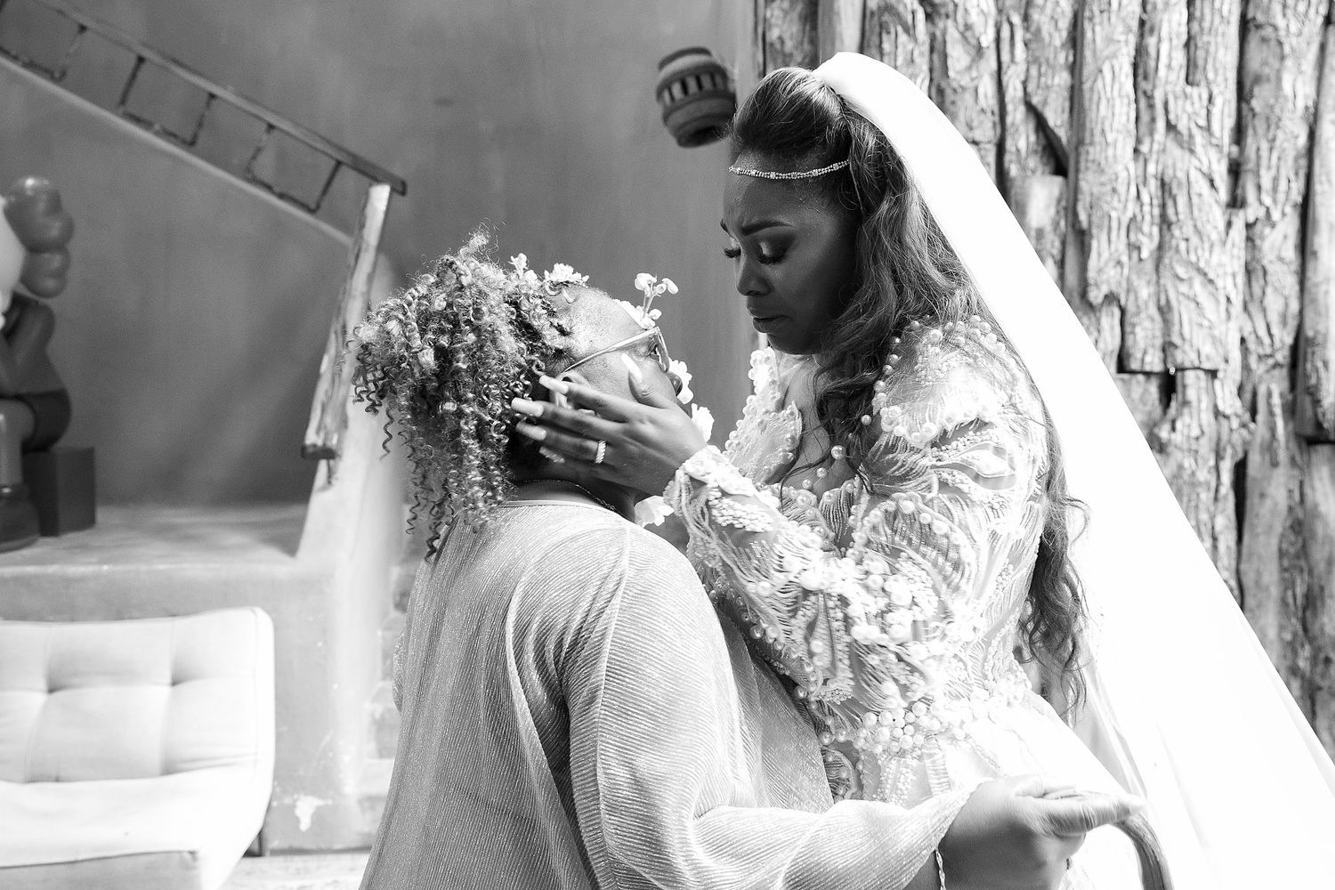Black and white wedding photo collage showing intimate moments between a couple during their celebration.