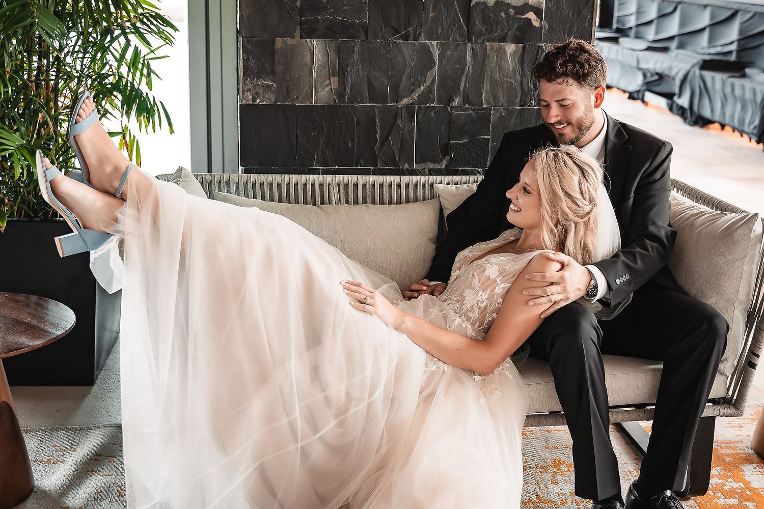 Wedding celebration moments captured in an elegant indoor venue with natural lighting.