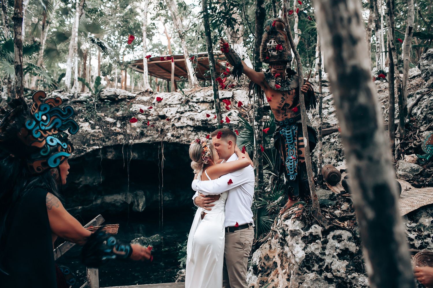 An intimate wedding ceremony moment captured in a natural forest setting.